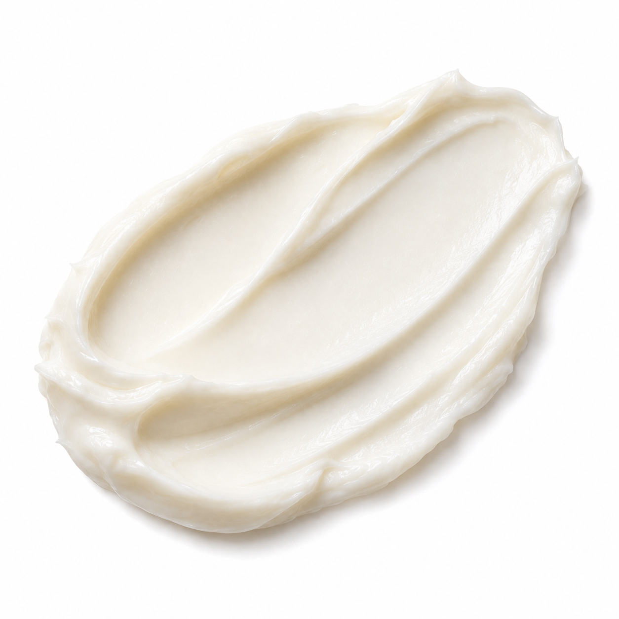 A dollop of thick, creamy off-white cosmetic cream or balm with swirled texture on a solid white background.